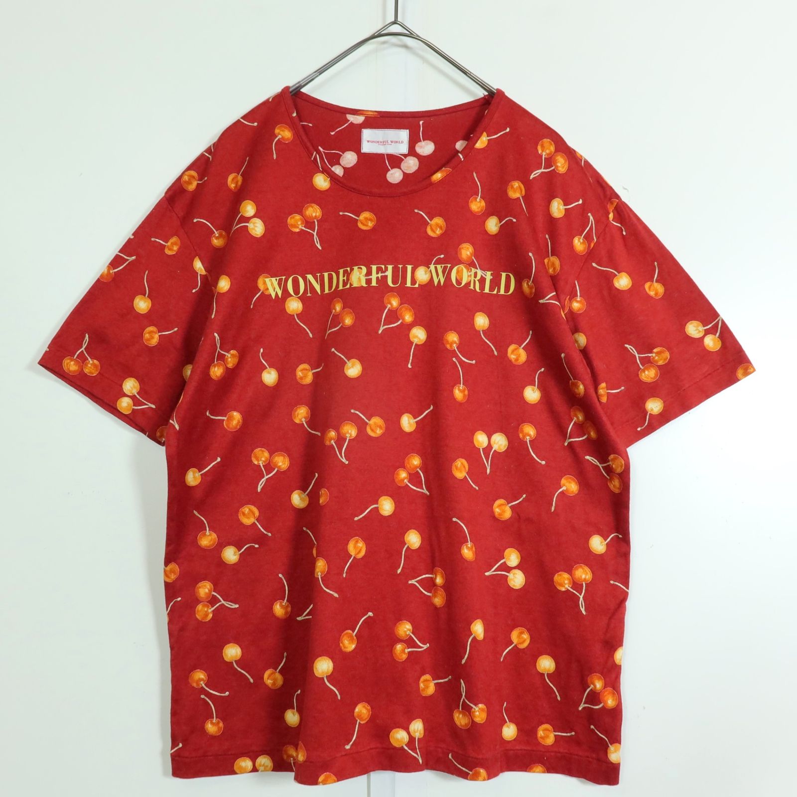 美品ワンダフルワールド ワンダフルワールド オレンジ系 半袖ブラウス 