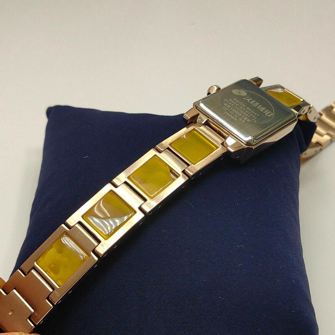 久慈琥珀 ソーラー 腕時計 シェル盤 琥珀入りメタルブレス レディース古着良品tete時計
