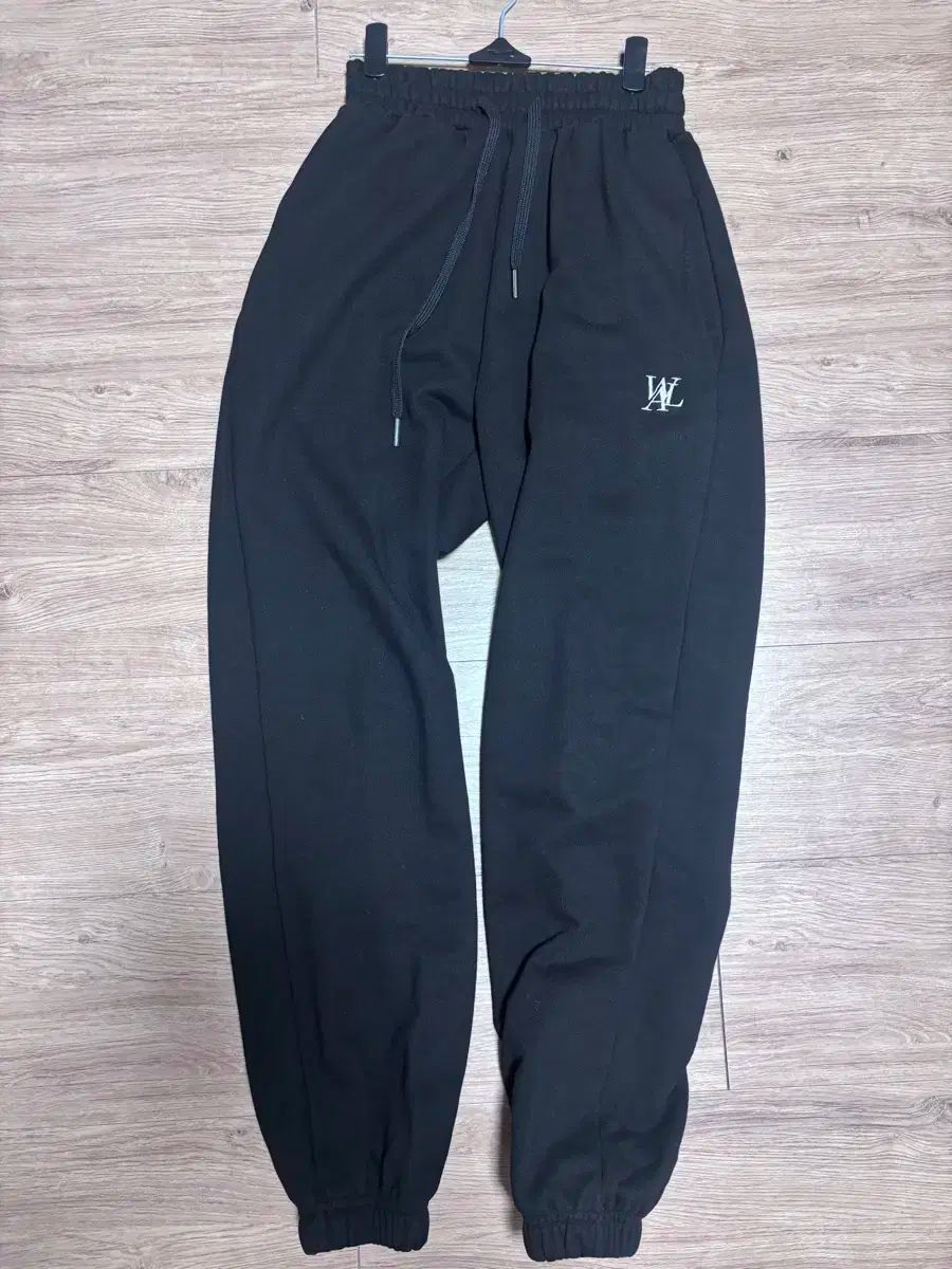wooalong シグネチャースタンダードジョガーパンツ wooalong signature jogger pantsの通販