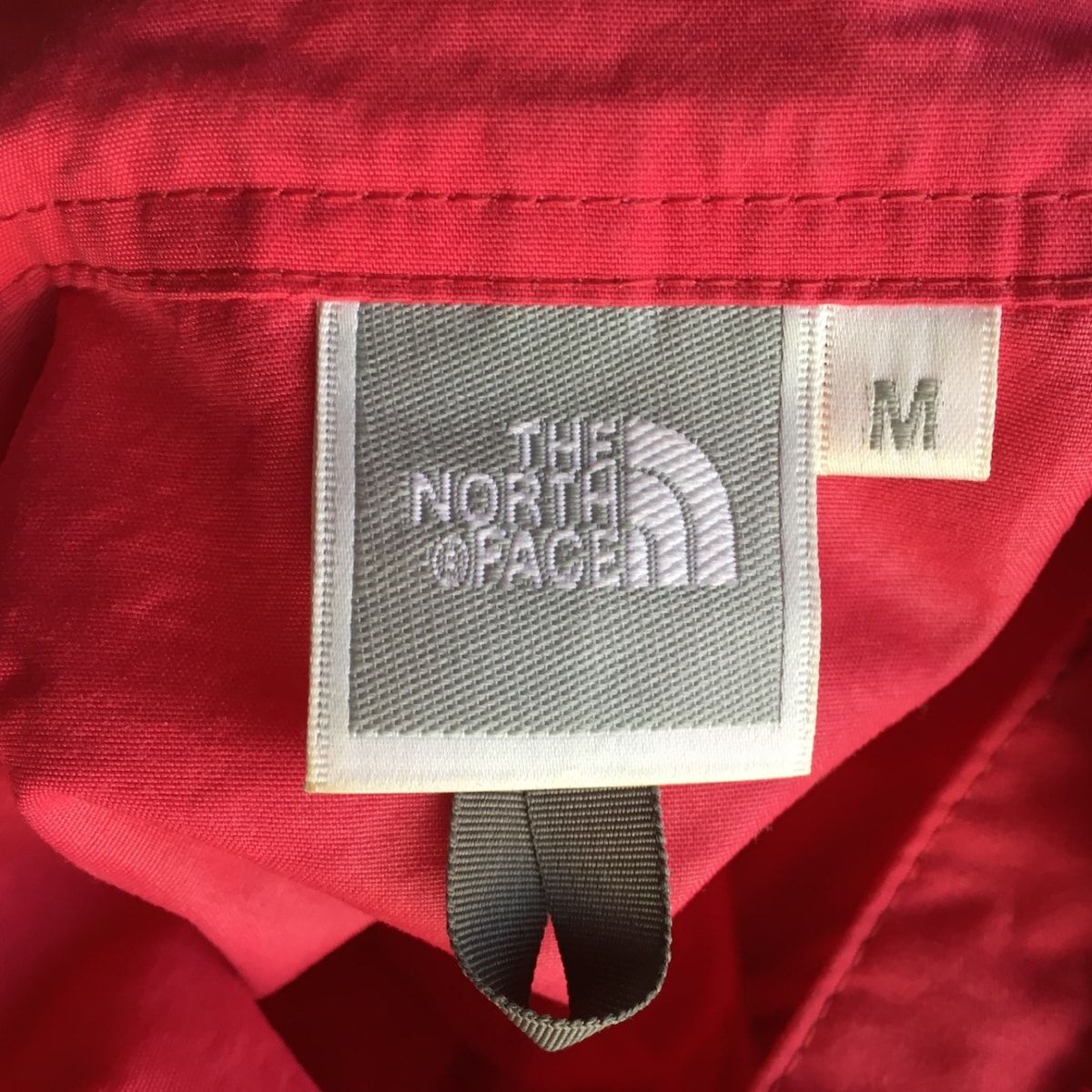 THE NORTH FACE(ノースフェイス) パーカー サイズM レディース - レッド 長袖/収納ポーチ付き - メルカリ