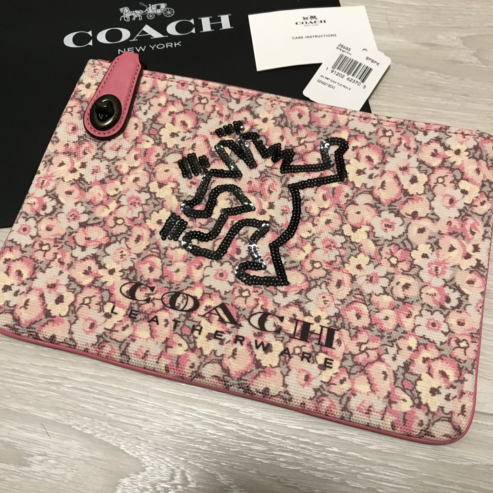 新品】コーチ COACH ピンク クラッチバッグ - メルカリ