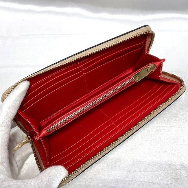 クリスチャン ルブタン ラウンドファスナー 長財布 メタリック ピンク