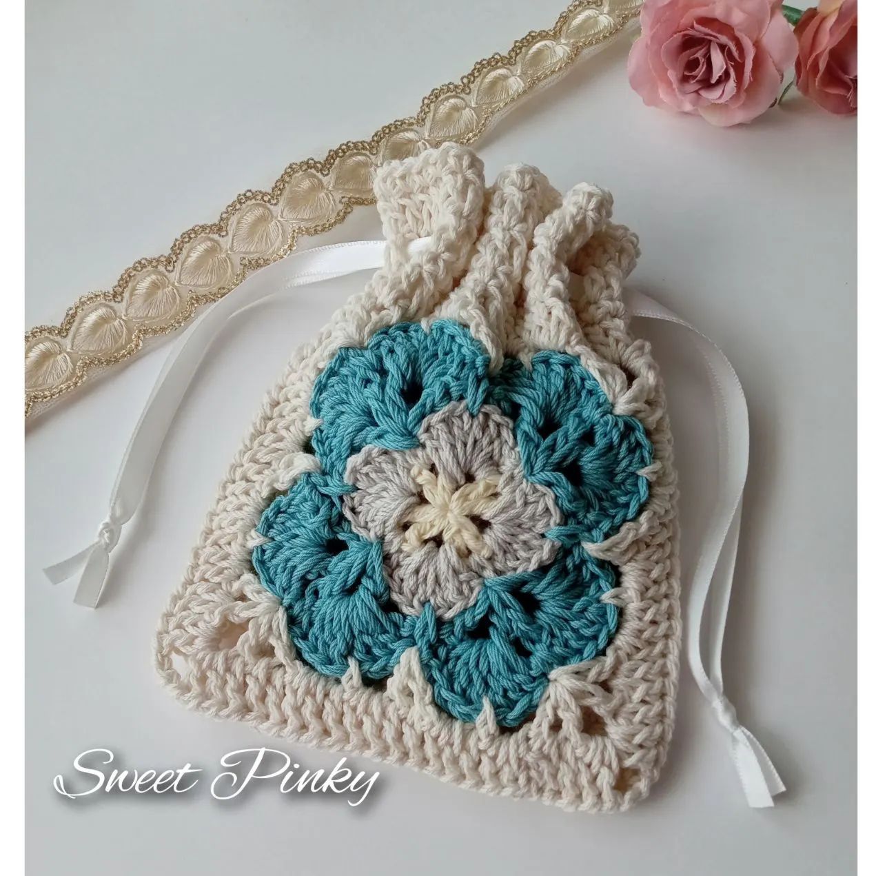 156】ターコイズブルー✿お花モチーフ編み✿巾着ポーチ - メルカリ
