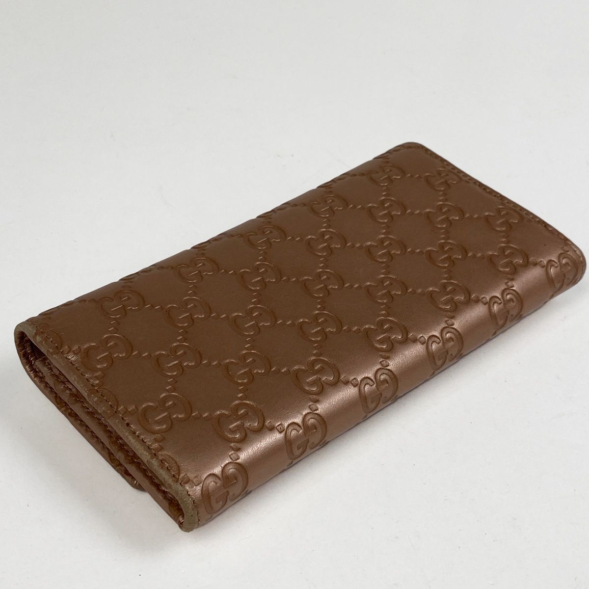 GUCCIシマ　二つ折り長財布　ラブリーハート　シグネチャー　メタリックピンク グッチ GUCCI グッチシマ 二つ折り 長財布 ラブリー ハート