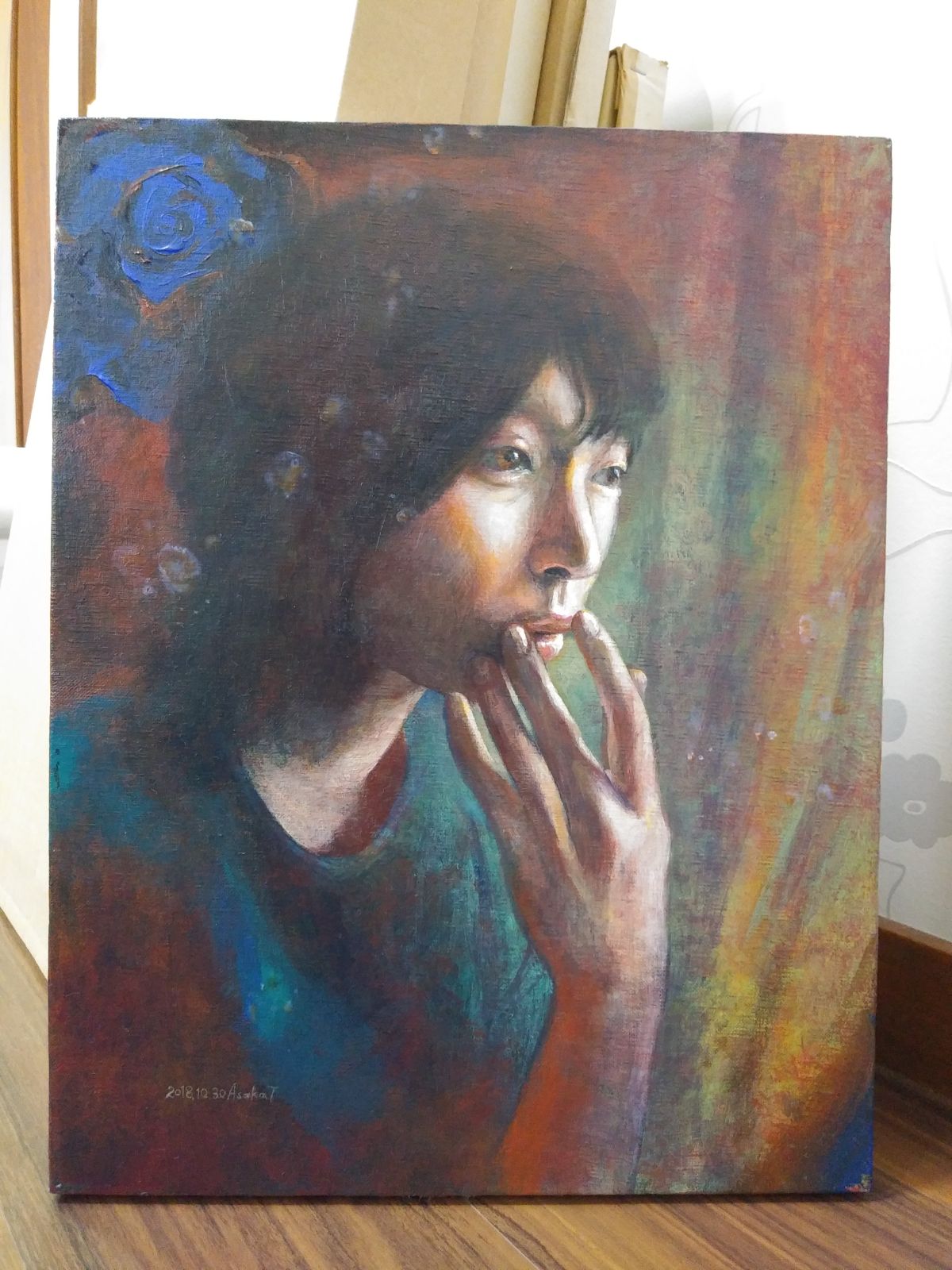 青い服の女性肖像画
