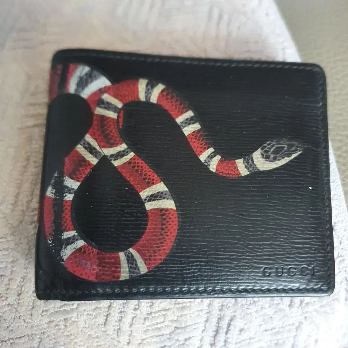 Gucci 蛇モチーフ 二つ折り財布 kyounokura_15930541