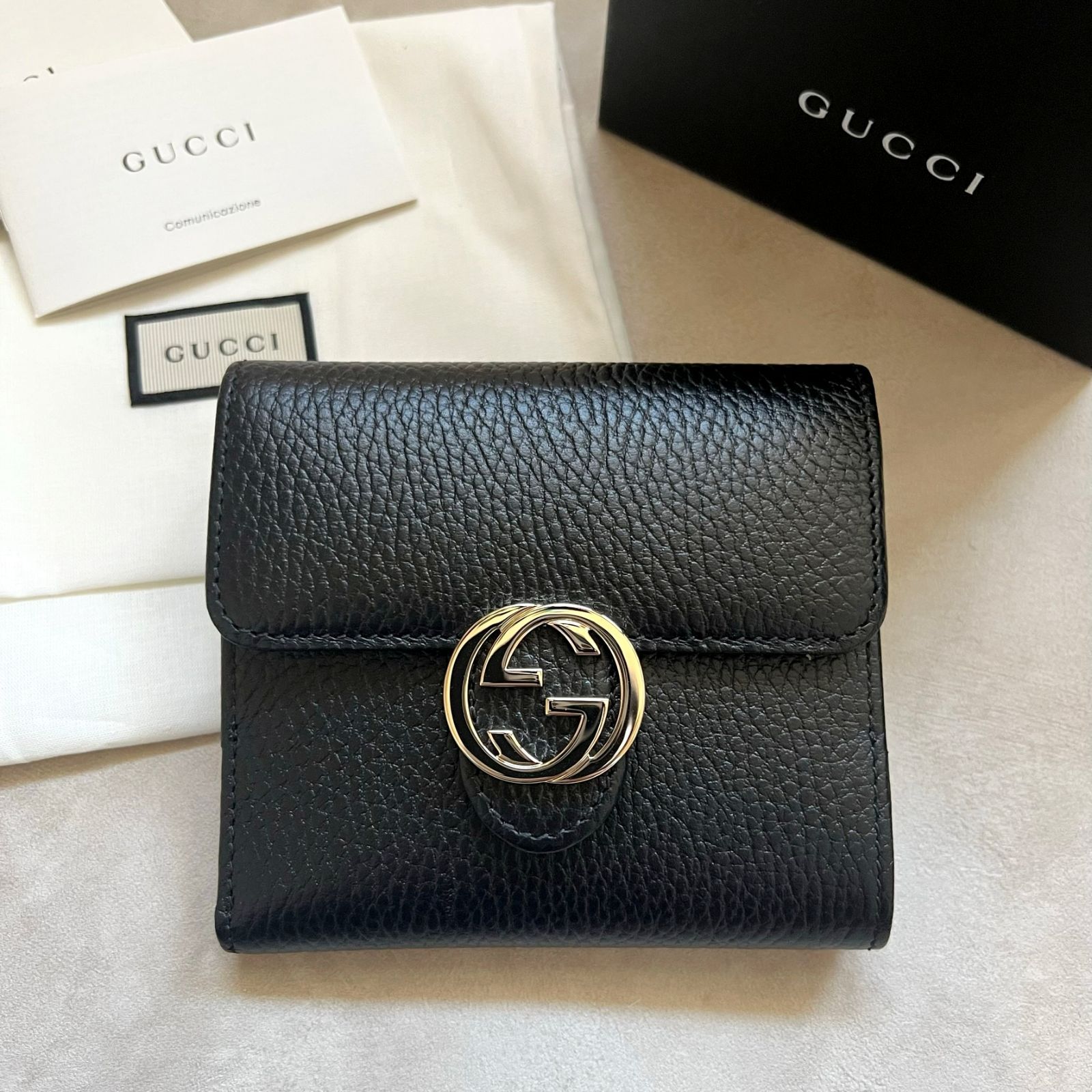 新品未使用タグ付き】GUCCI インターロッキング二つ折り財布 - メルカリ 