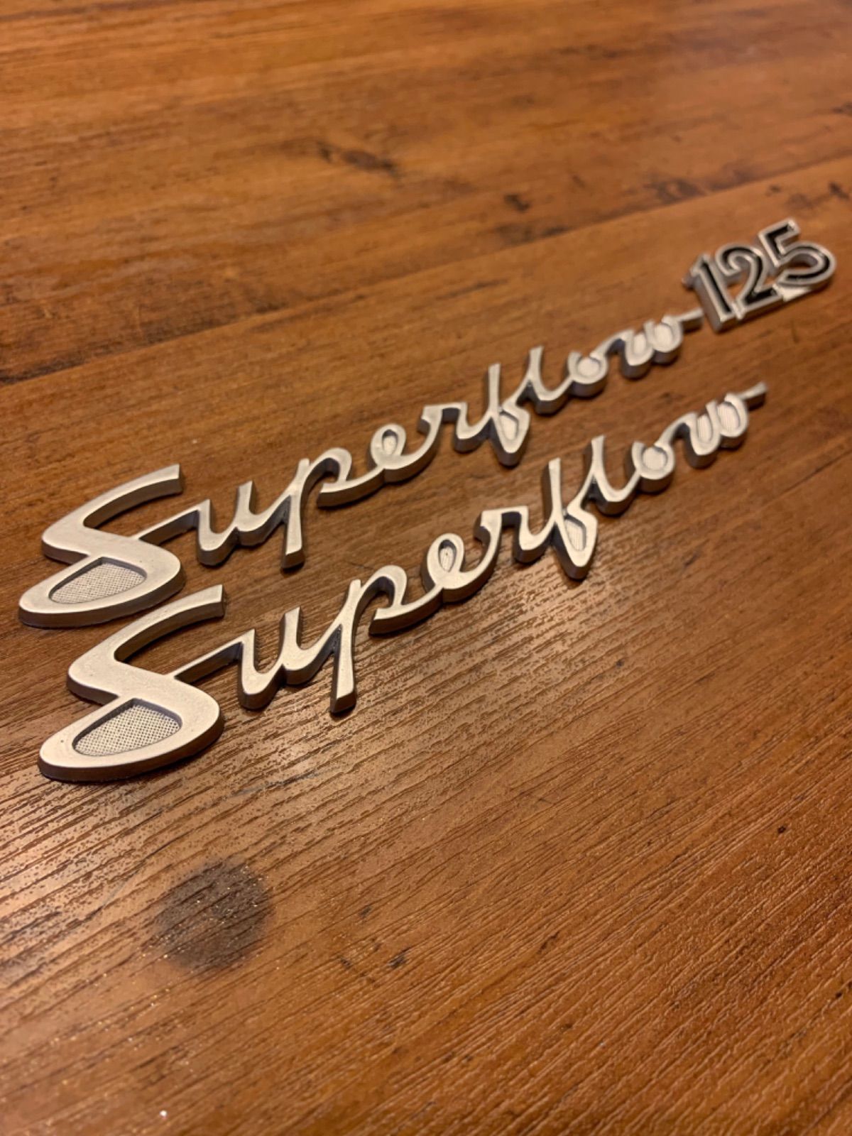 ラビット200 S601C リァカバー左エンブレム、レターマーク SUBARU