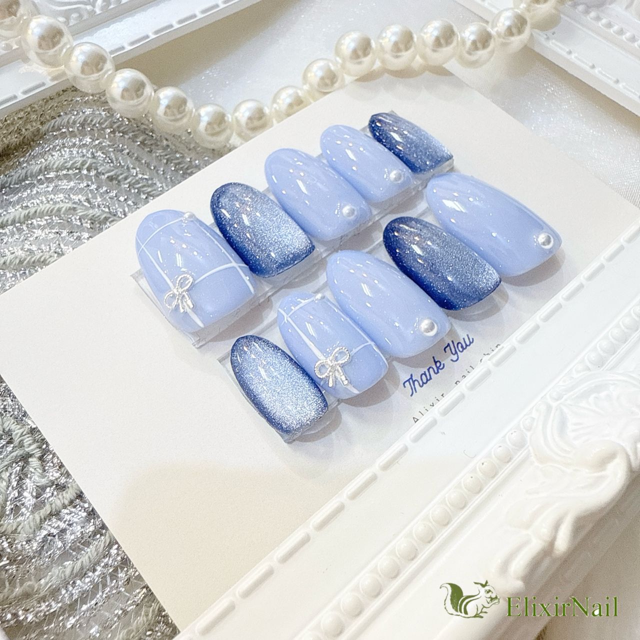 現品】ネイルチップ 青 水色 チェック リボン - メルカリ