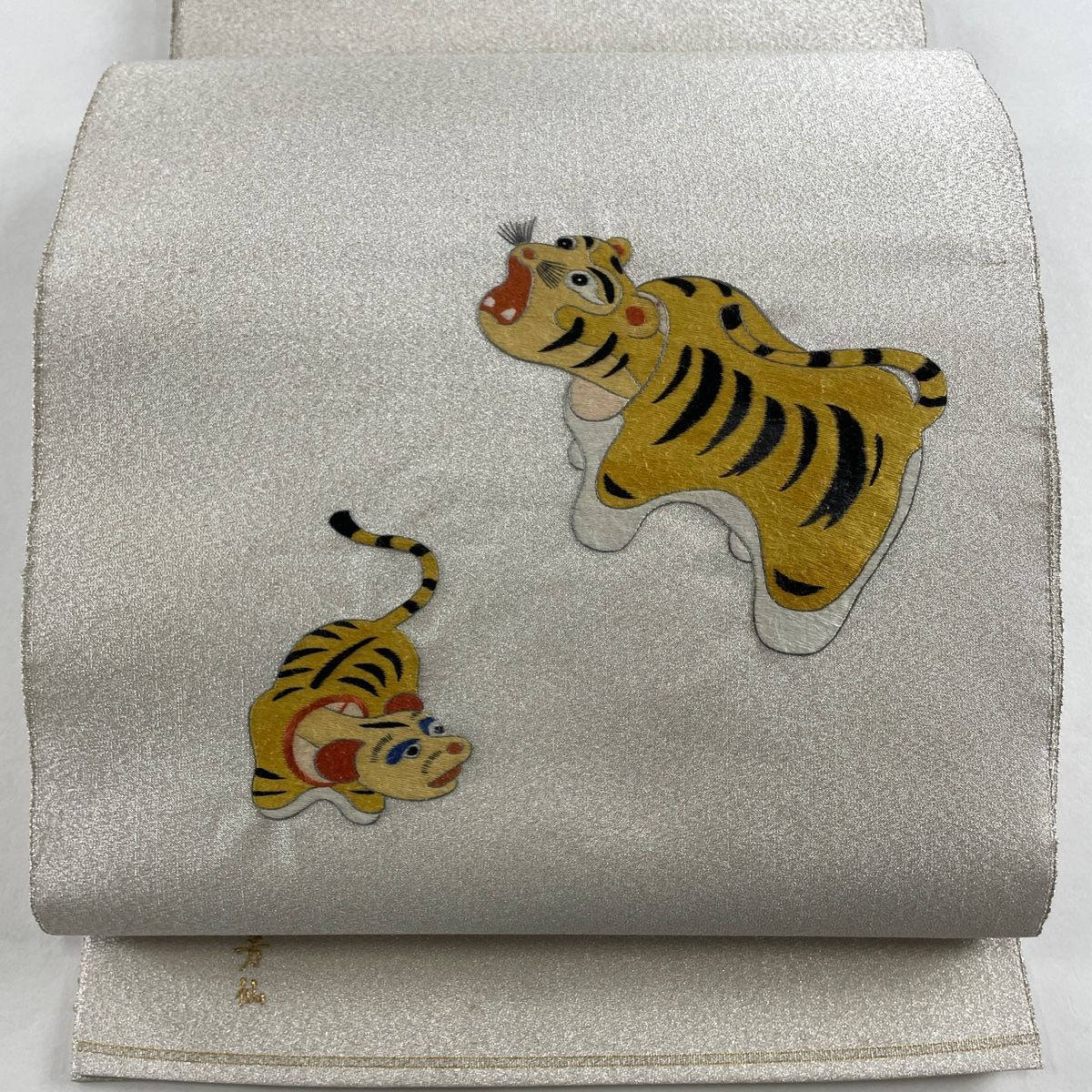 袋帯 秀品 関西仕立て 玩具 刺繍 銀糸 銀色 お太鼓柄 正絹