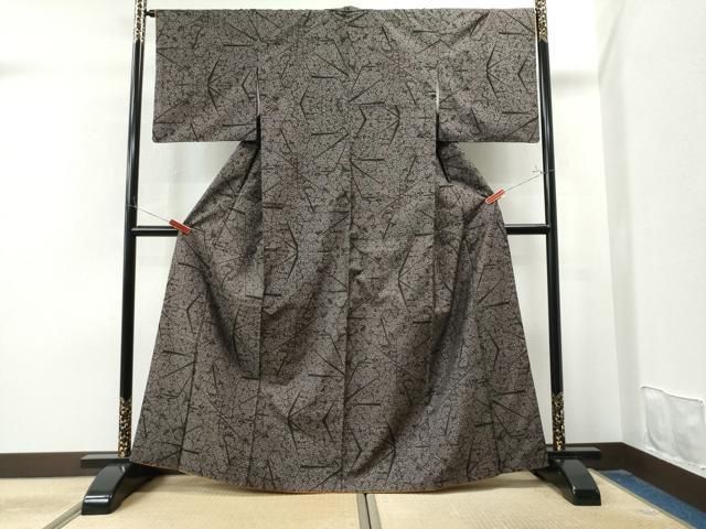 平和屋着物○本場大島紬 一元絣 色紙重ね花文 黒地 正絹 逸品  