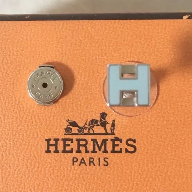 HERMESキューブピアス オレンジ - ピアス(両耳用)