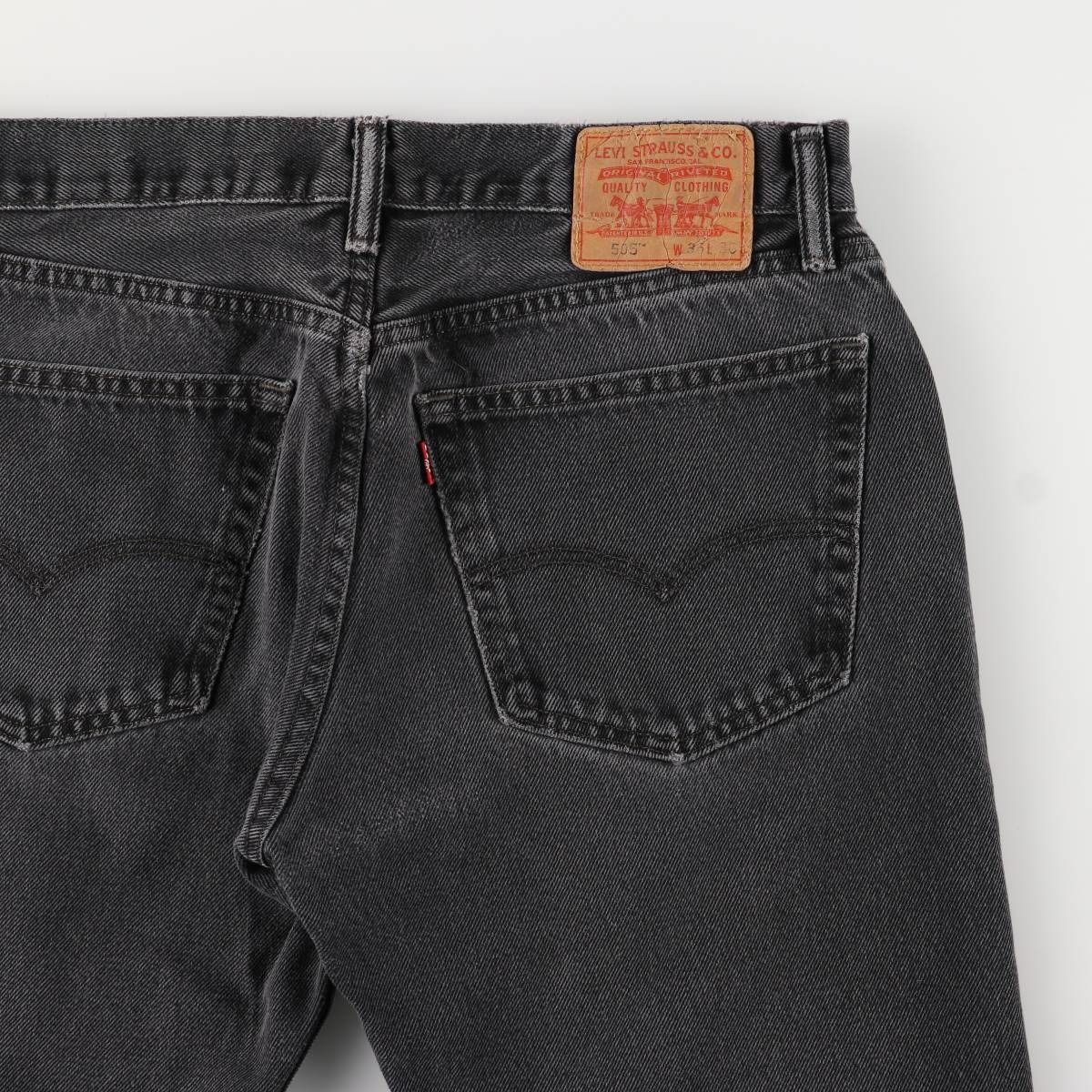 テーパードデニムパンツ