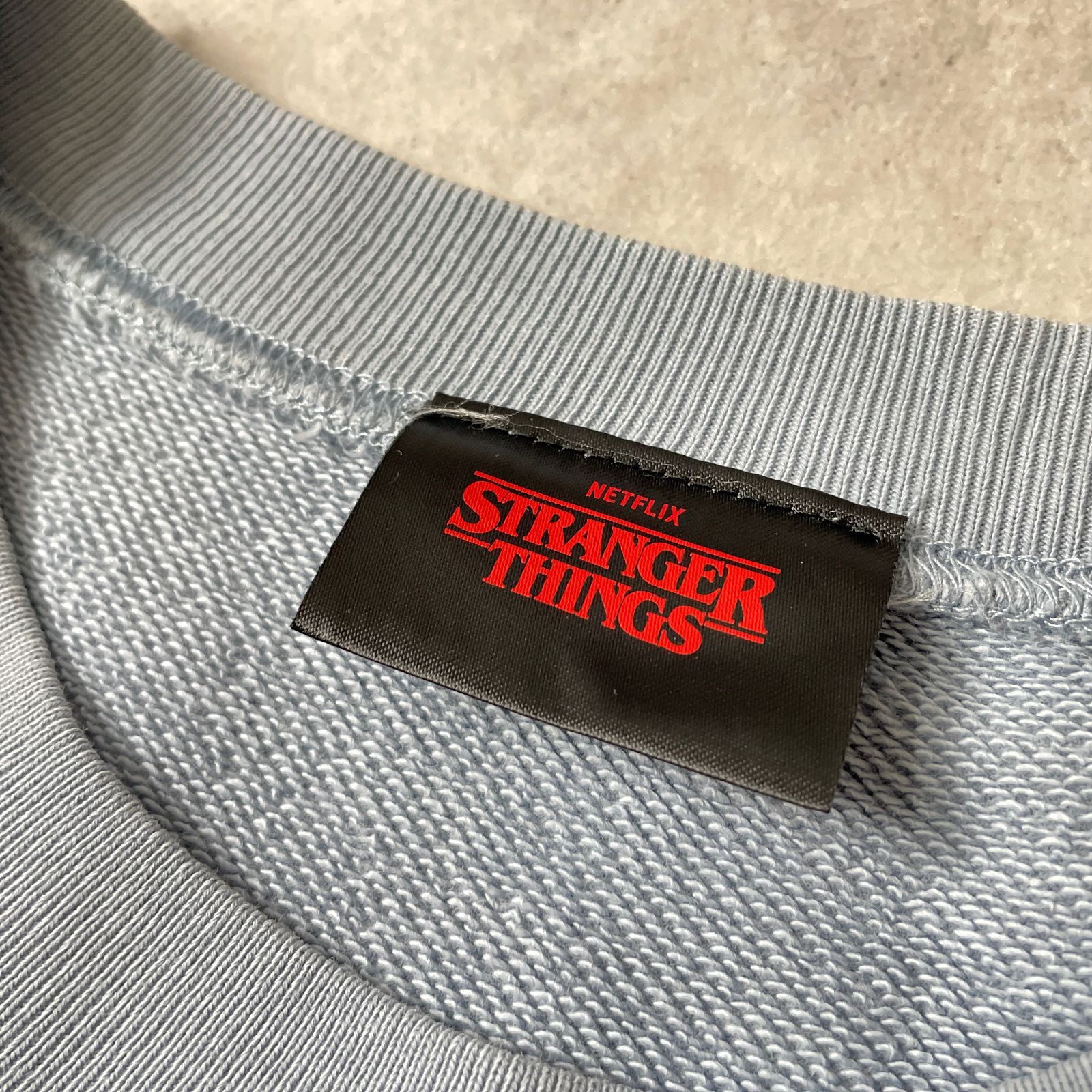 STRANGER THINGS PINK-O-MANIA プリント スウェット ネットフリックス