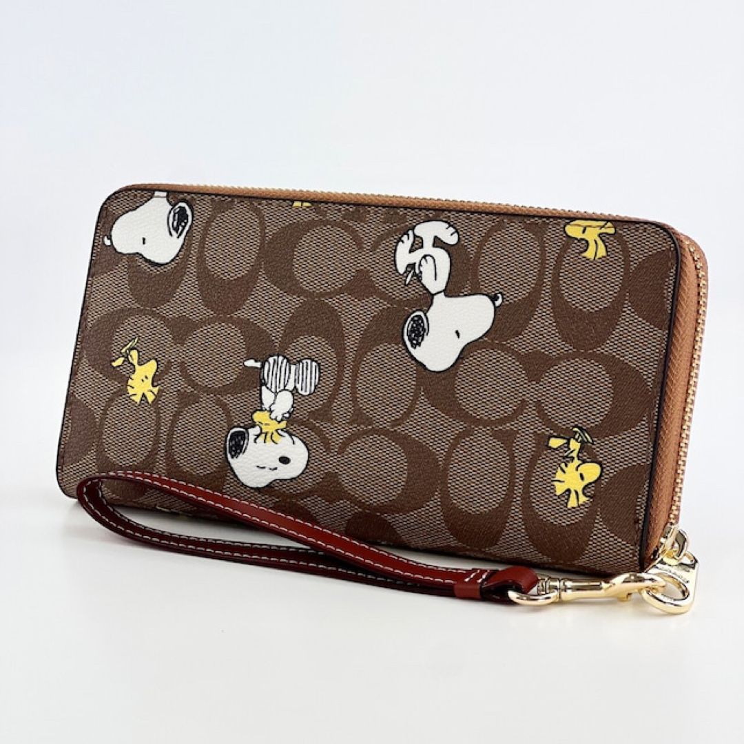 新品 Coach Peanuts 長財布 スヌーピー ウッドストック レディース