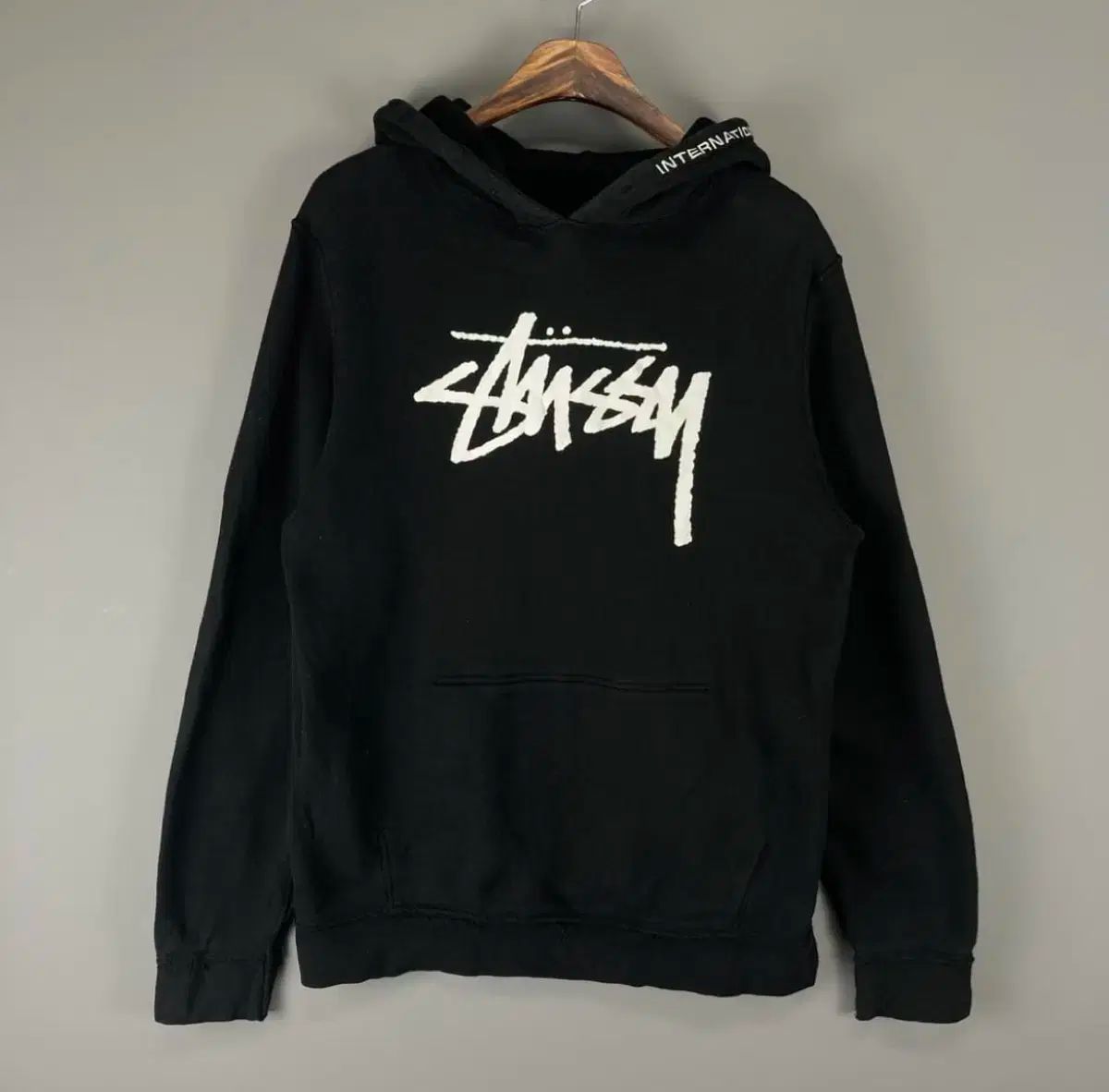 STUSSY ステューシー リバーシブル インターナショナル. フード付きTシャツ