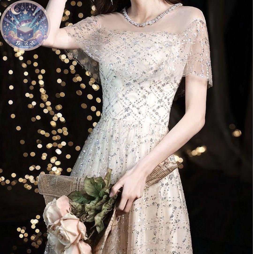 半袖 スパンコールの美しいロングイブニングドレス .
