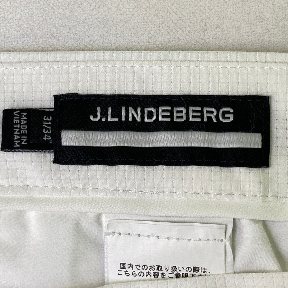 サイズ：31 J.LINDEBERG ジェイリンドバーグ  ストレッチパンツ ドットエア  ホワイト系 [240101453903] ゴルフウェア メンズ ストスト サイズ：31 J.LINDEBERG ジェイリンドバーグ ストレッチパンツ