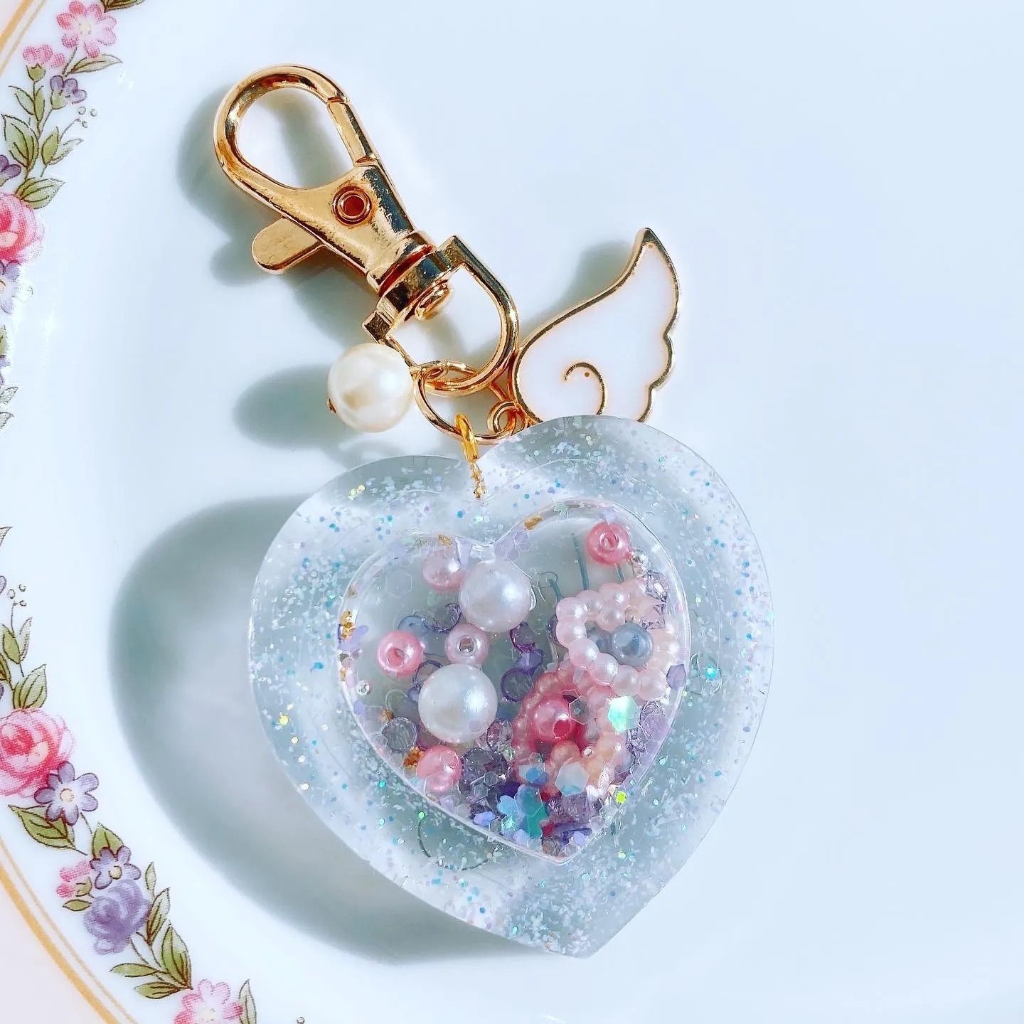 ハートシェイカー クリア レジン キーホルダー - メルカリ