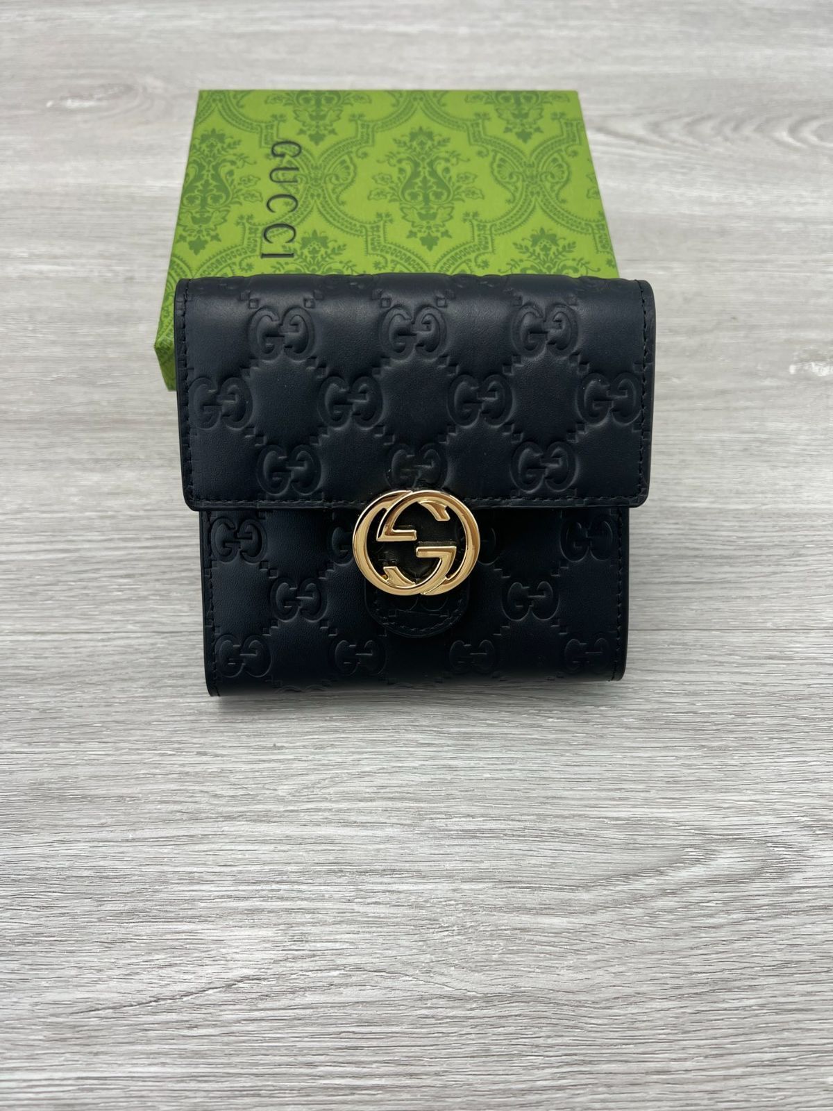 GUCCI GGエンボスレザー ウォレット NERO ジャンボGG コインウォレットブラック レザー | GUCCI公式