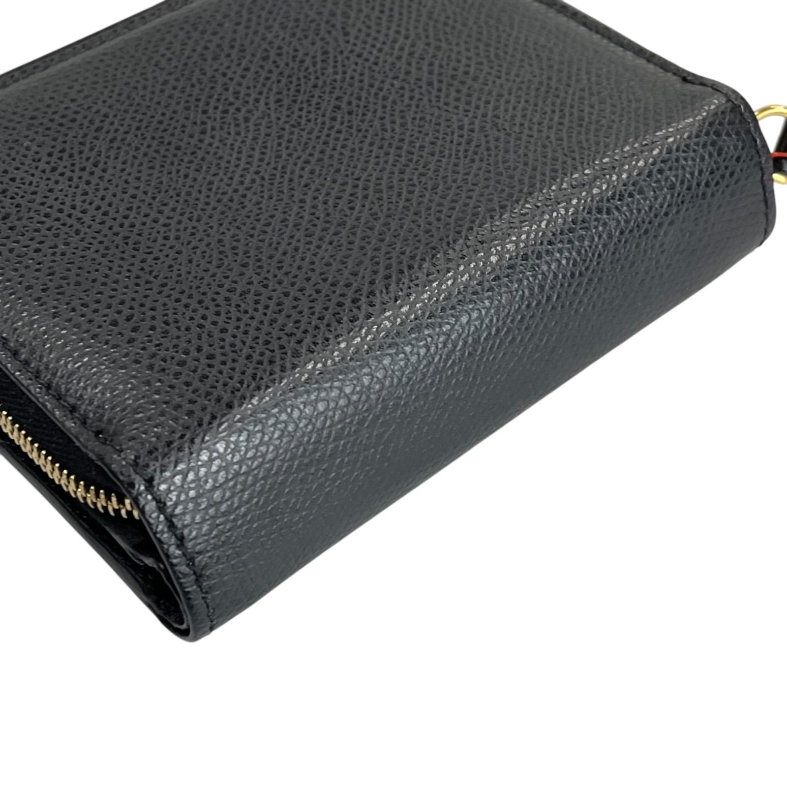 ○美品 フェンディFENDI 二つ折り財布 ラウンドファスナー エフイズ