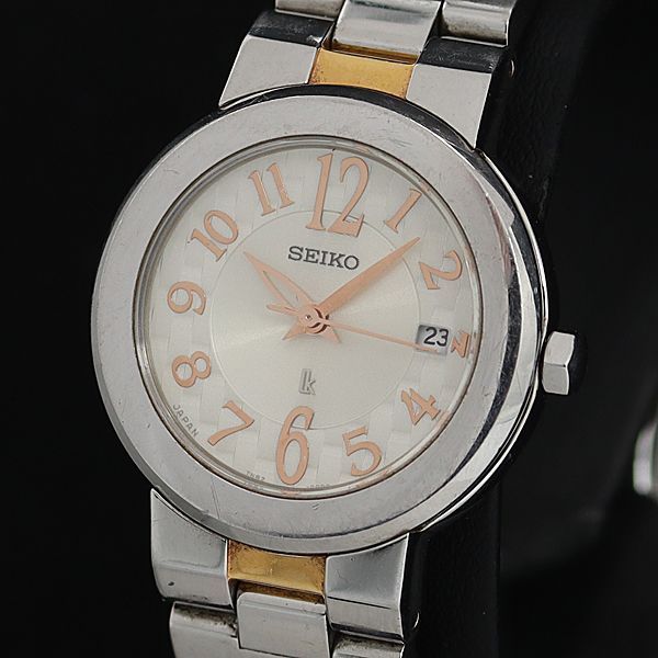 稼働 良品 セイコー ルキア 7N82-0CN0 QZ アイボリー文字盤 ラウンド デイト レディース腕時計 OSW 2000000 NSK