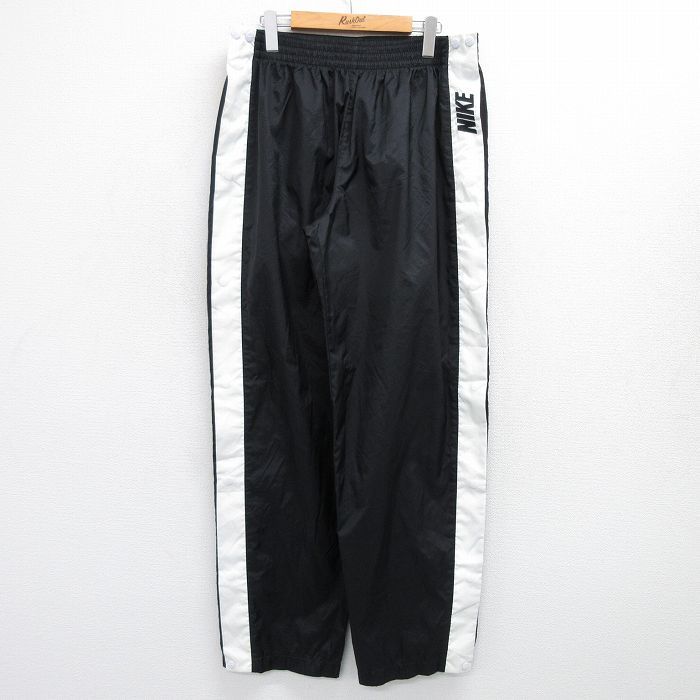W38/古着 ナイキ NIKE ナイロン パンツ メンズ 00s ワンポイントロゴ 黒他 ブラック 25feb12 中古 ボトムス ロング