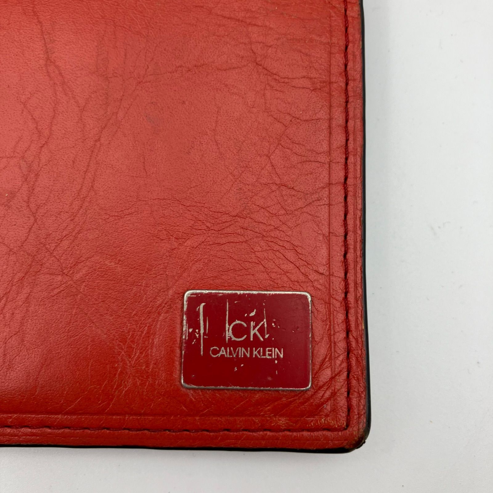 CK CALVIN KLEIN シーケー カルバンクライン 長財布 二つ折り レザー 牛革 オレンジ ブラック メンズ SG158-35