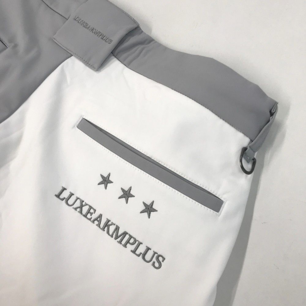 サイズ：M LUXEAKMPLUS リュクスエイケイエムプラス  裏起毛 ストレッチパンツ バイカラー グレー系 [240101423573] ゴルフウェア メンズ ストスト サイズ：M LUXEAKMPLUS リュクスエイケイエムプラス 裏起毛