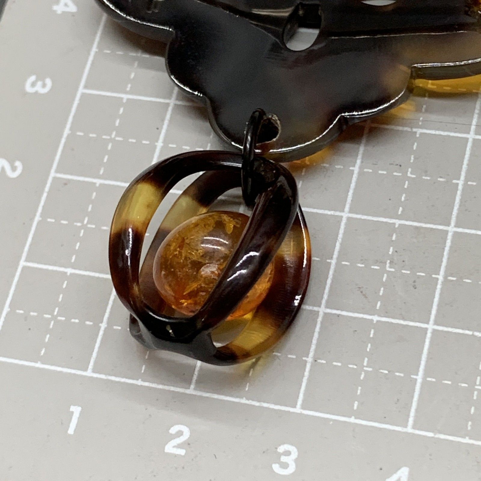 O333未使用保管品 本物 べっ甲柄 琥珀 ブローチ 重量5g 鼈甲色 べっ