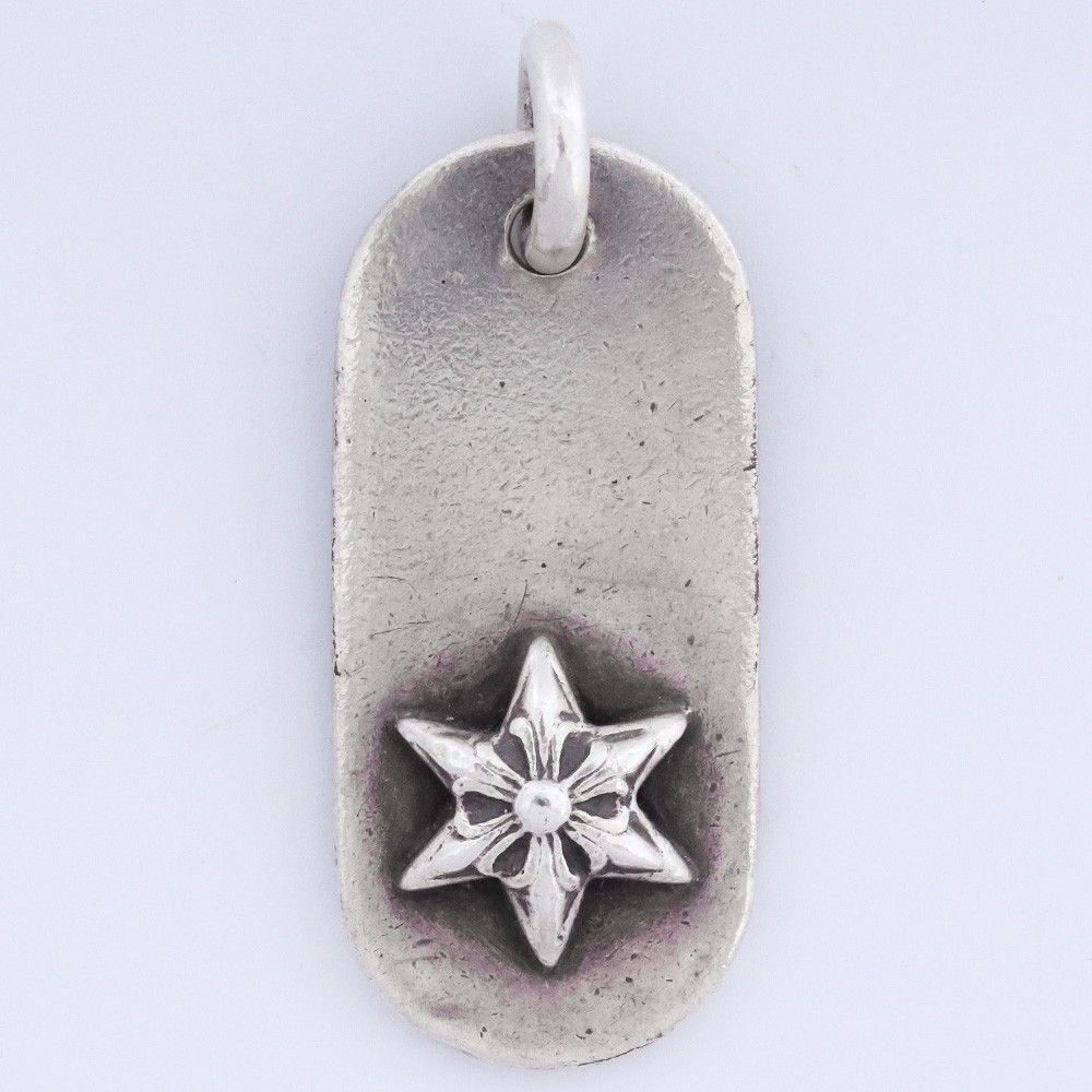 CHROME HEARTS レイズドスター ドッグタグ シルバー - メルカリ