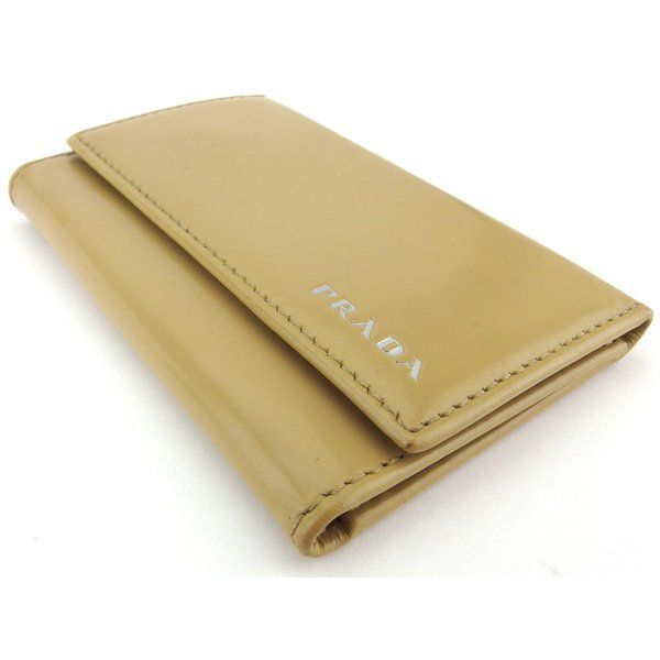プラダ キーケース 4連キーケース レディース メンズ ロゴ ベージュ