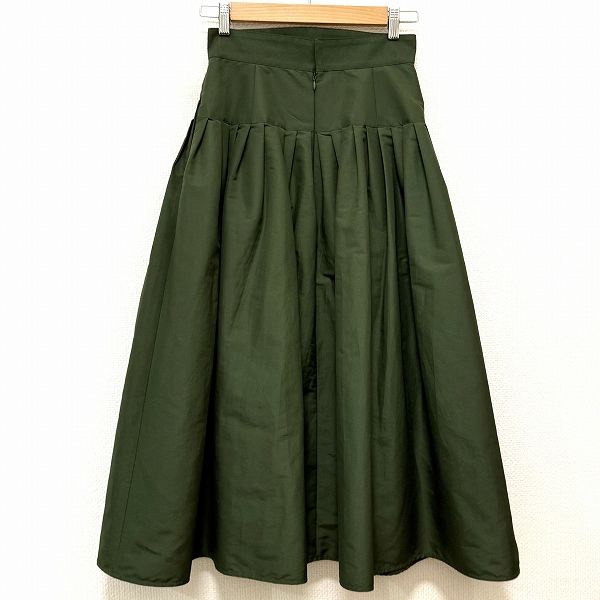 anc シートーキョー SHE Tokyo スカート 36 カーキ系 光沢 バック