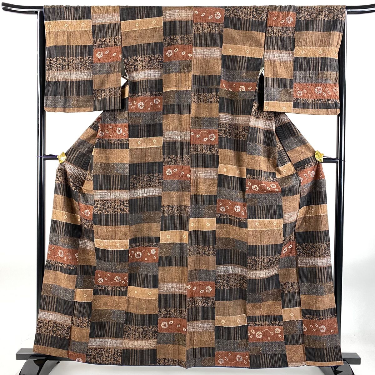 小紋 身丈162.5cm 裄丈65.5cm M 袷 吉澤与市 証紙 段縞 草花 絞り 茶色 正絹