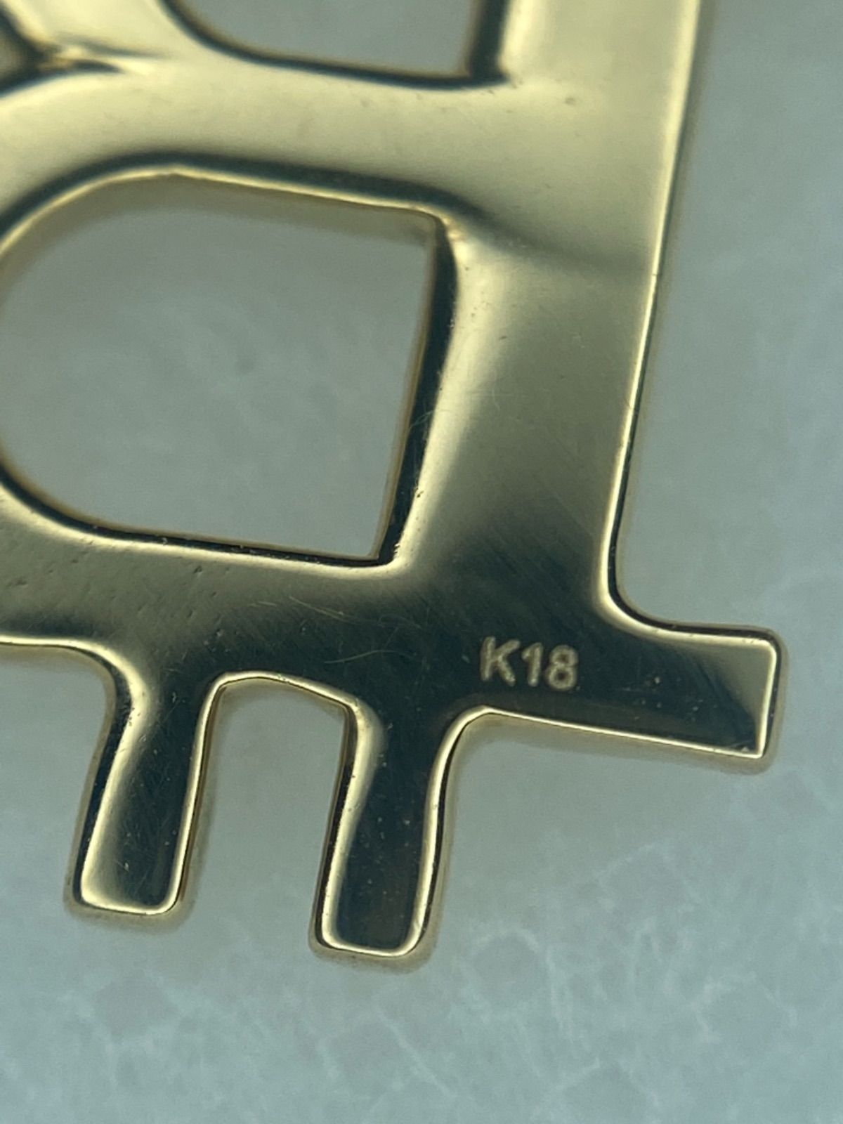 k18 ビットコインピアス BTC - メルカリ