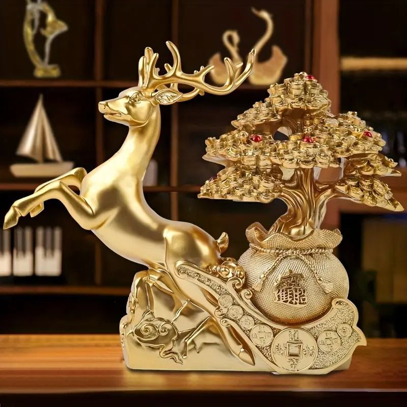 金色の鹿と樹木の置物