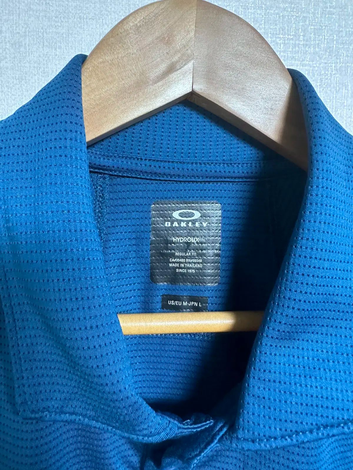 ヴィンテージ OAKLEY(オークリー) ポロTシャツ 半袖 青 L
