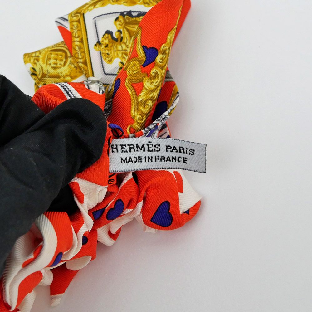 HERMES シュシュ オレンジ エルメス シュシュ ベッラ シルク ヘアゴム オレンジ Aランクの買取