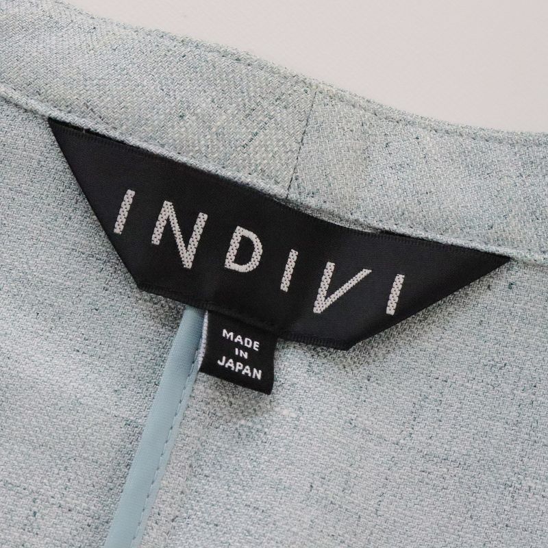 美品 インディヴィ INDIVI トリアセテート混リネンライクVネック