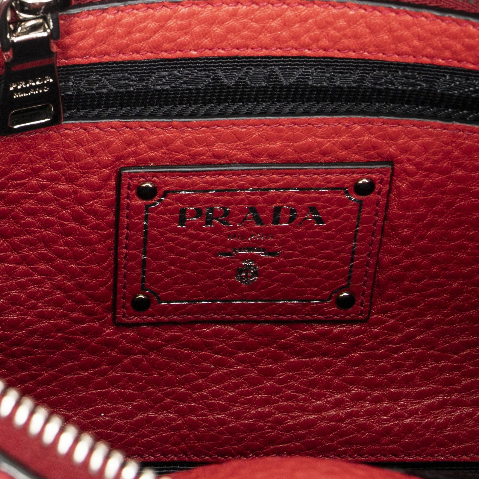 プラダリストレットポーチ赤ヴィテロ