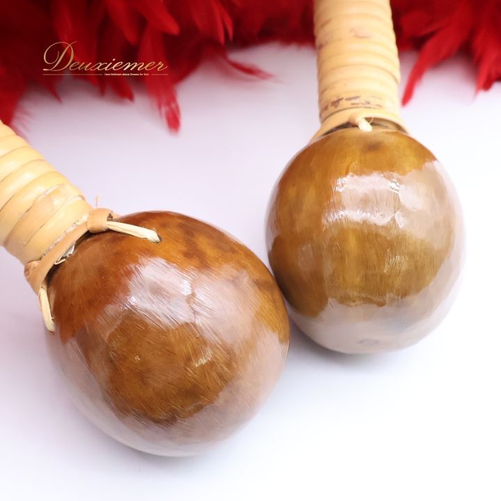 ウリウリ　フラダンス用羽根楽器　一体型 ウリウリ 一体型 フラダンス 赤黄 ウリウリ フラダンス 楽器 羽直径25