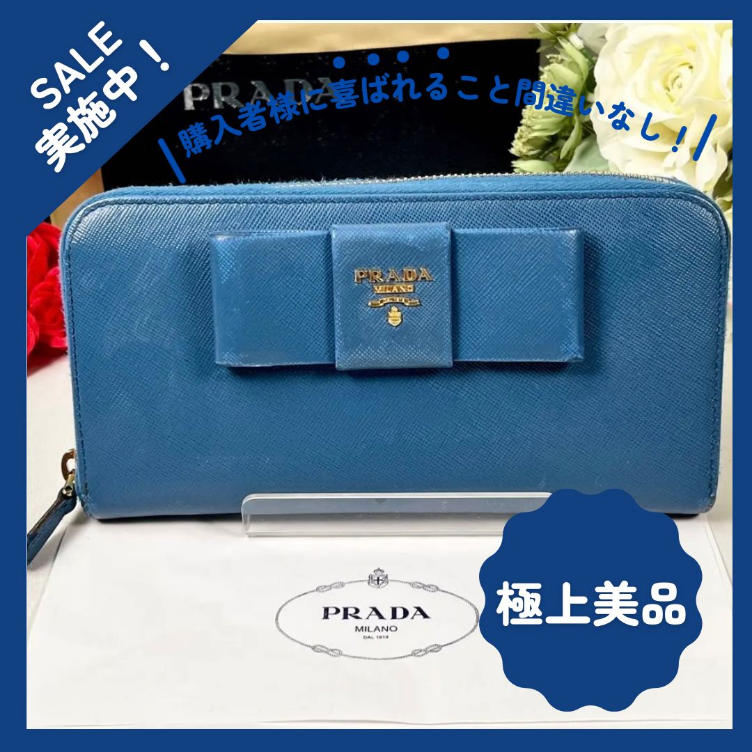 プラダ PRADA サフィアーノ リボン付ラウンドファスナー長財布 - メルカリ