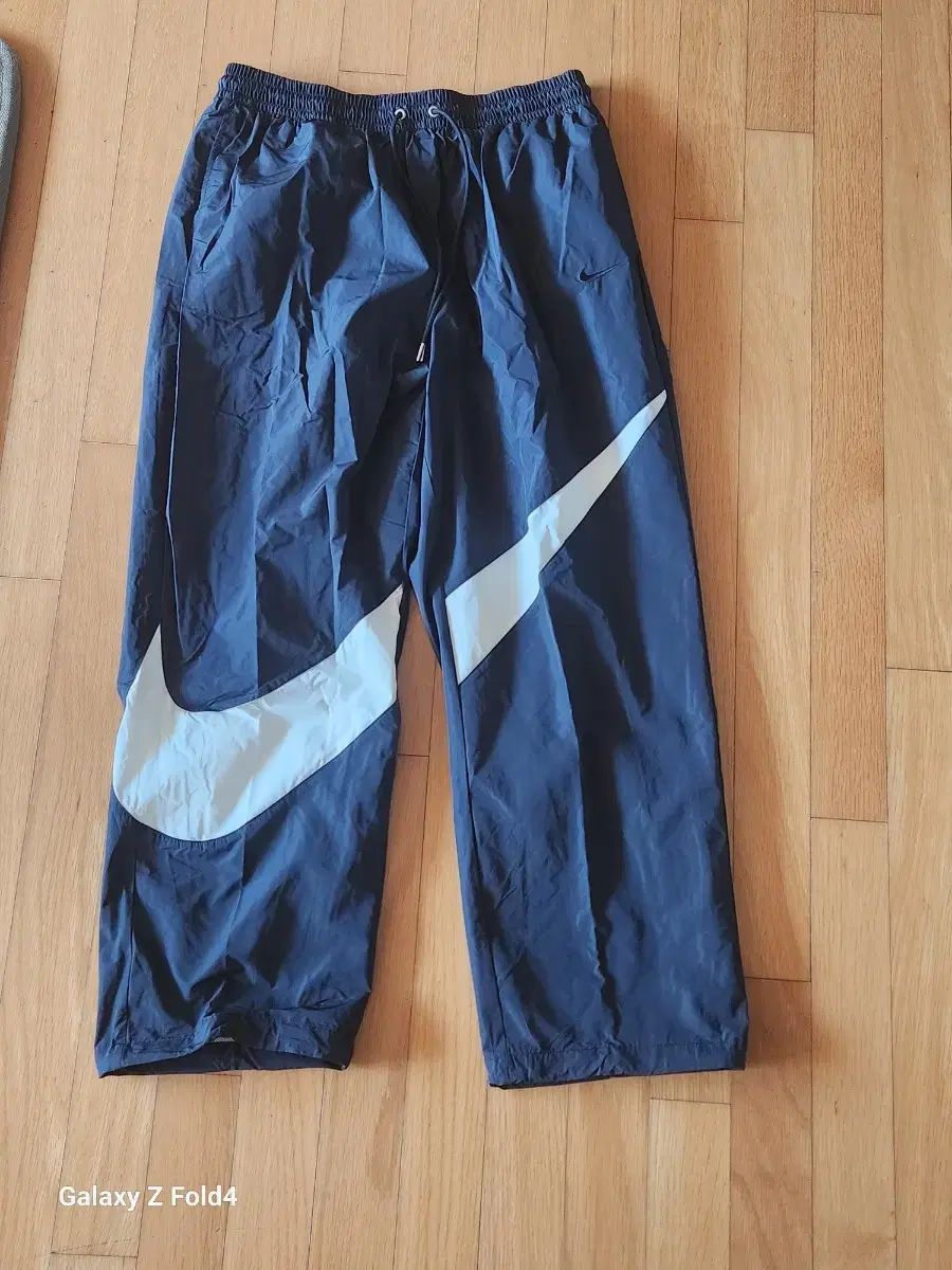 【雷市場（ポンジャン）商品韓国直送】 新品 Nike(ナイキ） スウッシュ ウーブン パンツ XL 出品
