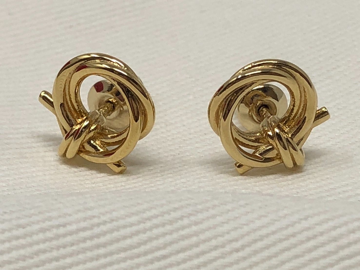 ◇Ferragamo フェラガモ ガンチーニ ツイスト ピアス ゴールド系
