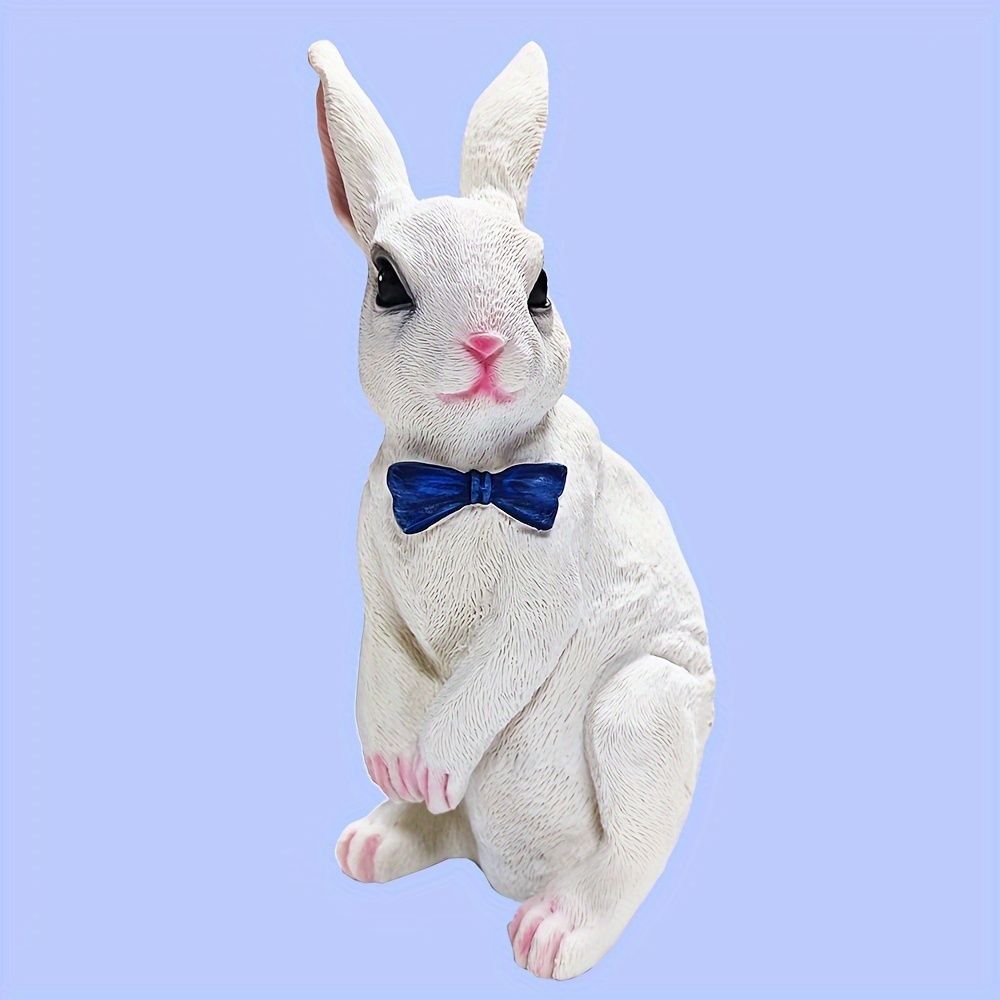 置物 オブジェ ガーデンオーナメント 花をつけているウサギ 蝶