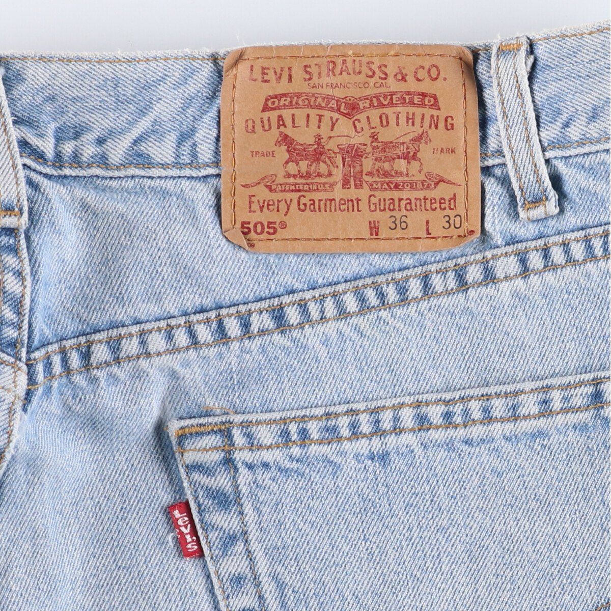 テーパードデニムパンツ