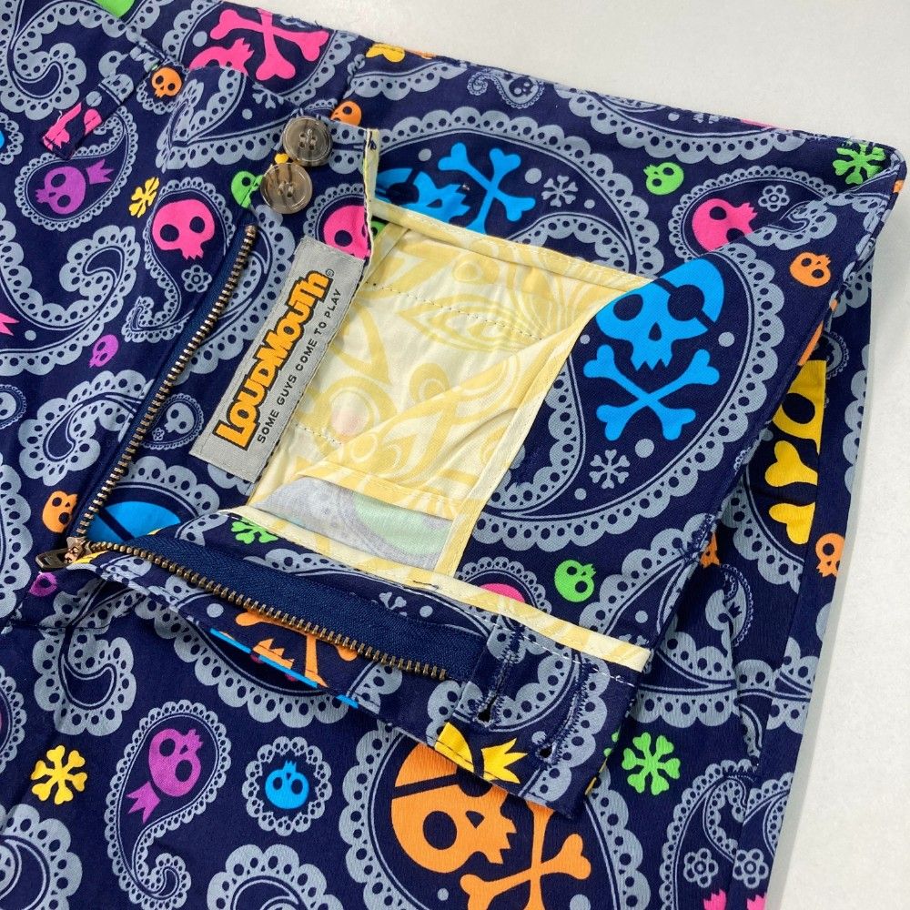 サイズ：32×UF LOUD MOUTH ラウドマウス  ストレッチパンツ スカル ジョリーロジャー ペイズリー総柄 ネイビー系 [240101455072] ゴルフウェア メンズ ストスト サイズ：32×UF LOUD MOUTH ラウドマウス ストレッチパンツ