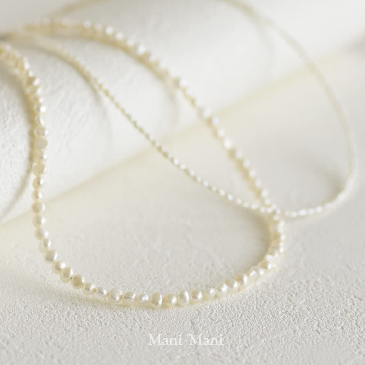 金属アレルギー対応留具 形状記憶 誕生石 プレゼント うれしいスタイルキープ ホワイトデー 小粒 卒業式 入学式 ネックレス 結婚式 バロックパール 書 巾着袋 Mani お手入れクロス付