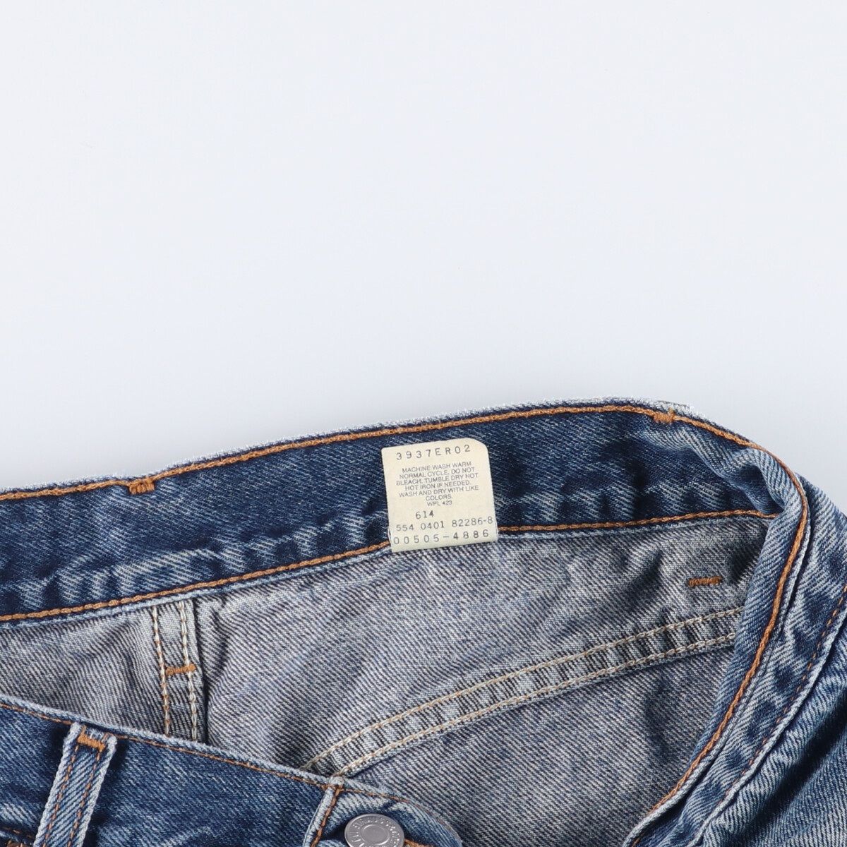 テーパードデニムパンツ