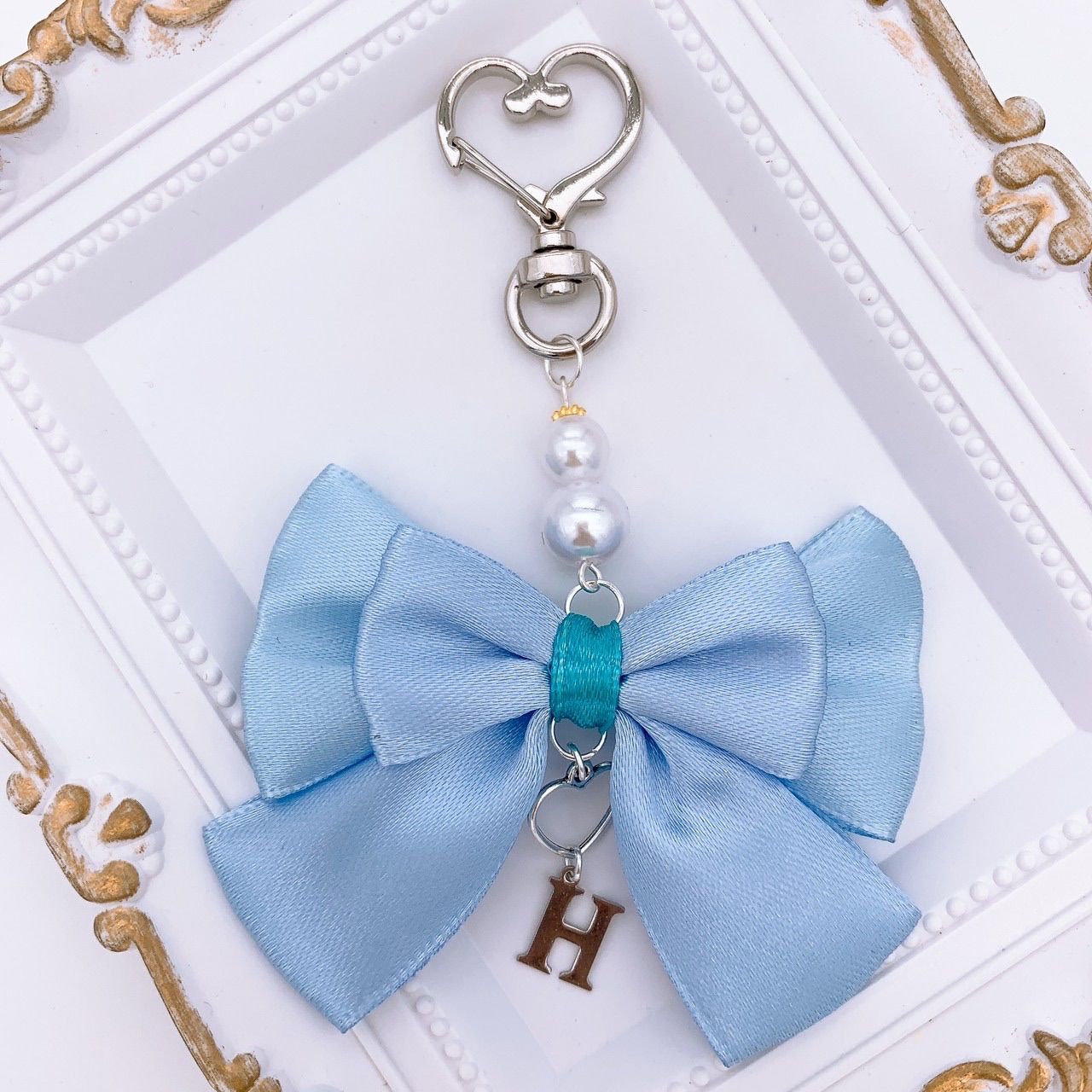 メンカラ＊水色リボンチャーム☆ハンドメイド - メルカリ